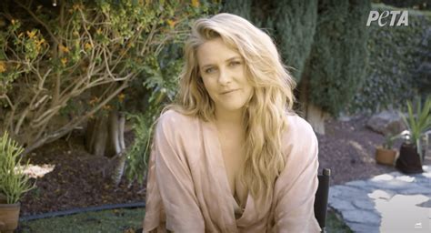 Alicia Silverstone poses in nothing but boots for PETA